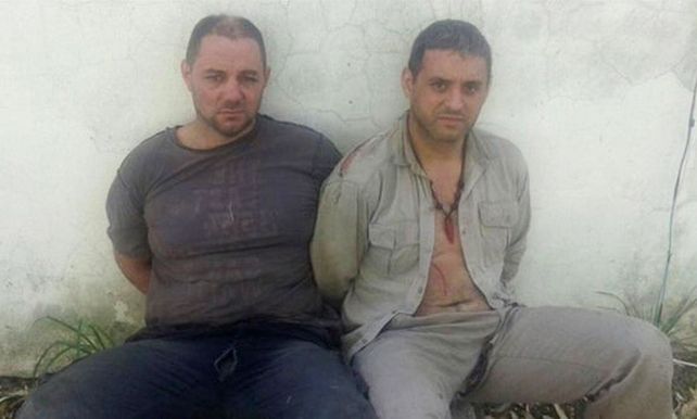 Cristian Lanatta y Víctor Schillaci al momento de ser detenidos en cercanías de Cayastá. (Foto: NA)