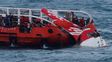 Equipos de rescate de Indonesia recuperan la cola del avión de Air Asia