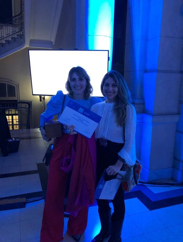 Cervera y Depetris con premio en mano.