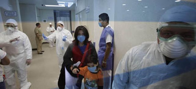 La gripe porcina desatada en M&eacute;xico se esparce por el mundo