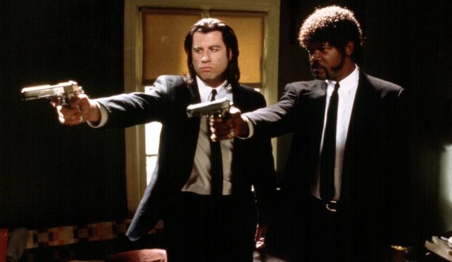 John Travolta y Samuel Jackson en "Tiempos violentos", de 1995, por el que obtuvo el premio Oscar a mejor guión original, además de la Palma de Oro en Cannes.