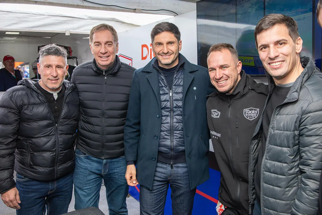 Santilli, Pullaro y el piloto Mariano Werner en Rafaela, la semana pasada.