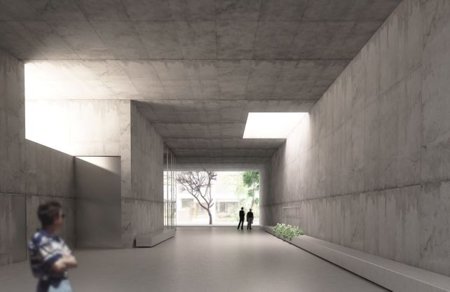 Espacio de memoria. Sobre la planta baja se diseñó un espejo de agua en un contexto de hormigón armado.