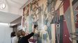 La primera galería techada de Rosario recupera su bello mural de Julio Vanzo
