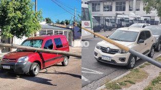 Autos dañados por la caída de postes de telefonía y alumbrado público.&nbsp;