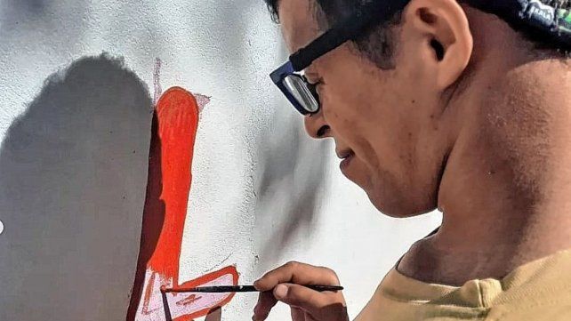 Mural ubicado en San Carlos Centro que representa el lenguaje de señas.