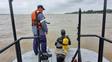 Buzos de Prefectura Naval participan en buscan a tres personas que cayeron al agua el jueves a la noche entre San Lorenzo y Fray Luis Beltrán