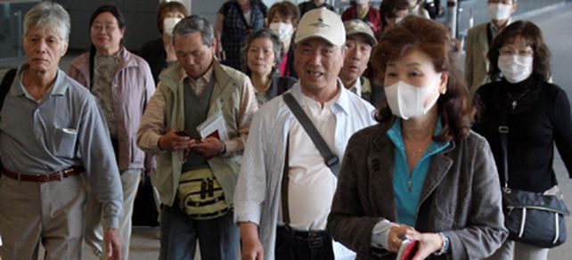 La OMS dice que la gripe porcina, por ahora, no es una pandemia