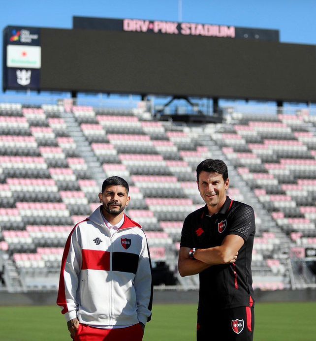 Ever Banega y Mauricio Larriera
