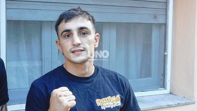El santafesino Alexis Picante Sicilia junto a su entrenador el Chino Bernardino González.