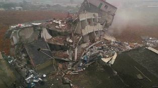 Hay 59 desaparecidos por el hundimiento de 33 edificios por deslave