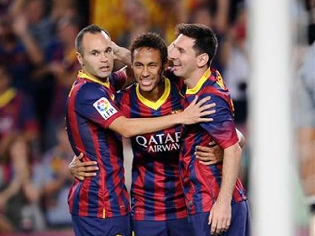 Iniesta junto a Neymar y Messi. Foto: AP
