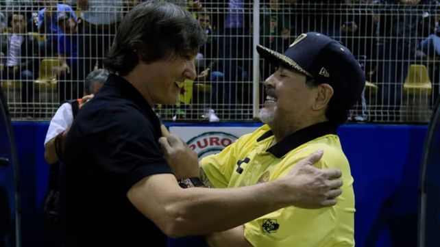 Caballero con Diego Maradona