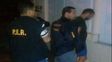 Miguel Angel Lolo Laferrara al ser detenido por agentes entrerrianos y santafesinos.