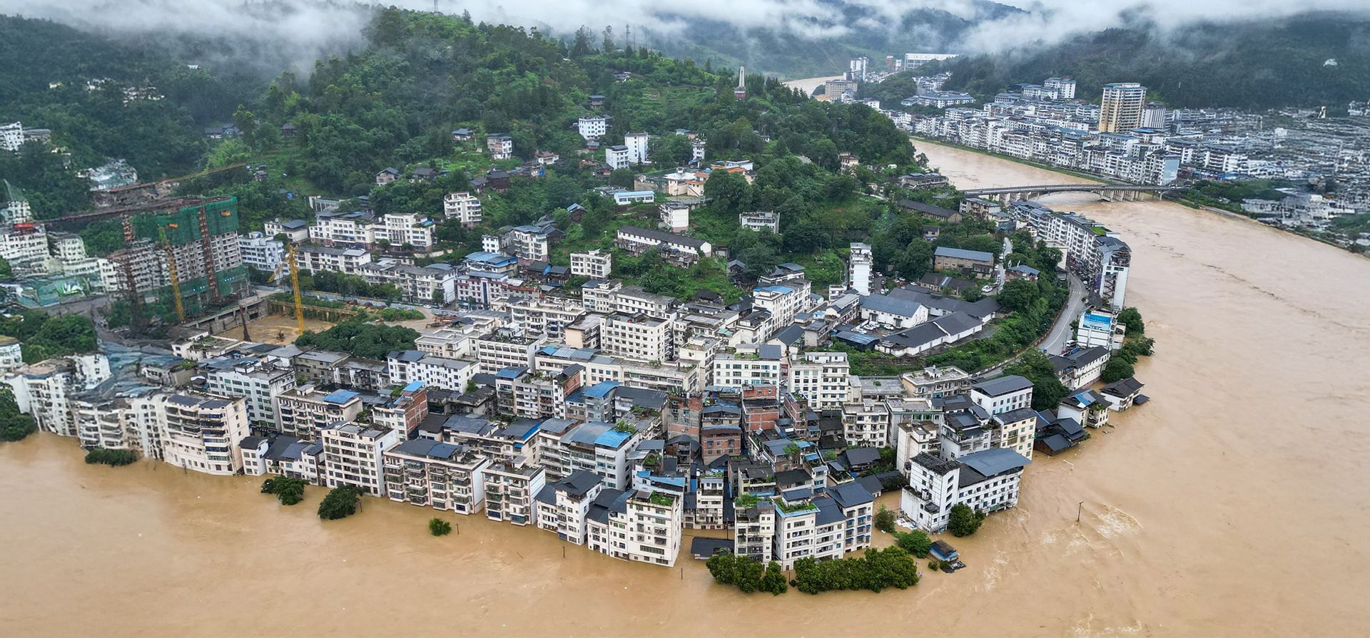 Más de 80.000 personas han huido de sus hogares debido a las graves inundaciones que afectan a la provincia suroccidental de Guizhou, Congjiang, China. Fotografía: STR/AFP/Getty Images Más de 80.000 personas han huido de sus hogares debido a las graves inundaciones que afectan a la provincia suroccidental de Guizhou, Congjiang, China. Fotografía: STR/AFP/Getty Images