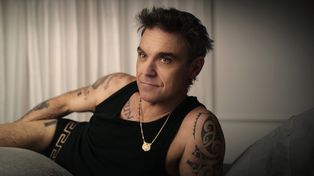 Un Robbie Williams de entrecasa comenta y analiza los peores demonios de su pasado.&nbsp;