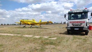 Incendios en Islas del Delta: Bomberos Voluntarios de Ceibas asisten al avión hidrante con base en San Pedro, SNMF