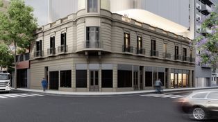 El diseño cuida especialmente uno de los rasgos más reconocibles del edificio: la cúpula de la esquina. La nueva construcción se aleja de ese punto para no taparlo ni competir visualmente.